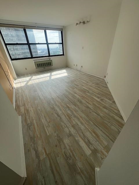 7004 Boulevard East, Unit 30G Guttenberg, NJ 07093 - Photo 18 of 34 a view of an empty room with a window