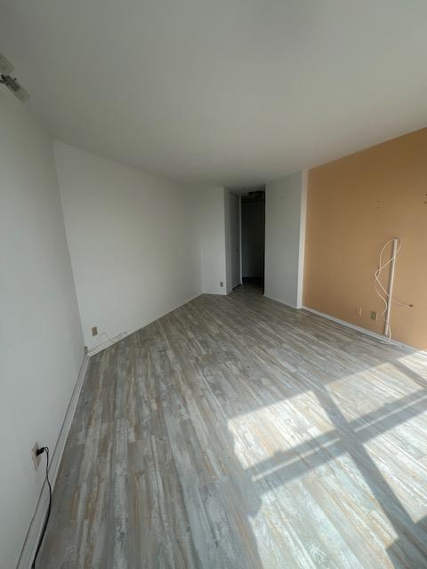 7004 Boulevard East, Unit 30G Guttenberg, NJ 07093 - Photo 20 of 34 a view of empty room with wooden floor