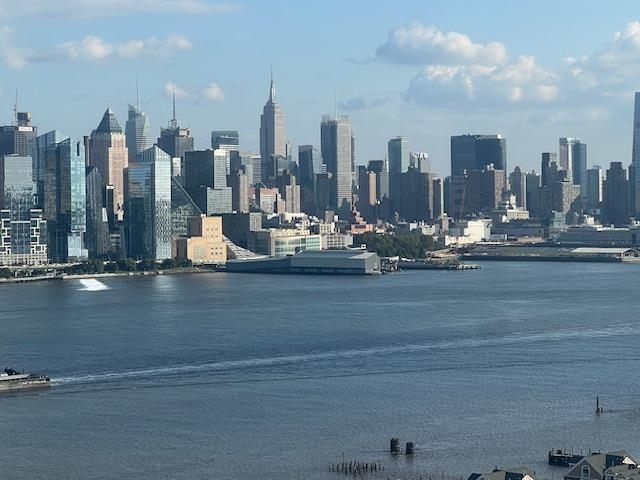7004 Boulevard East, Unit 30G Guttenberg, NJ 07093 - Photo 24 of 34 a view of a city with tall buildings