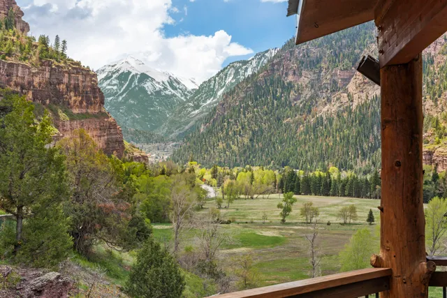 a view of swimming pool from a balcony