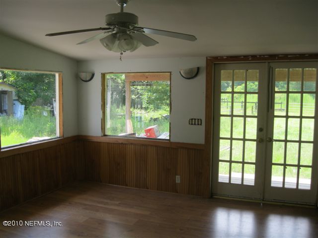 4185 Corbin Road St. Augustine, FL 32092 - Photo 7 of 12 a living room with hardwood floor