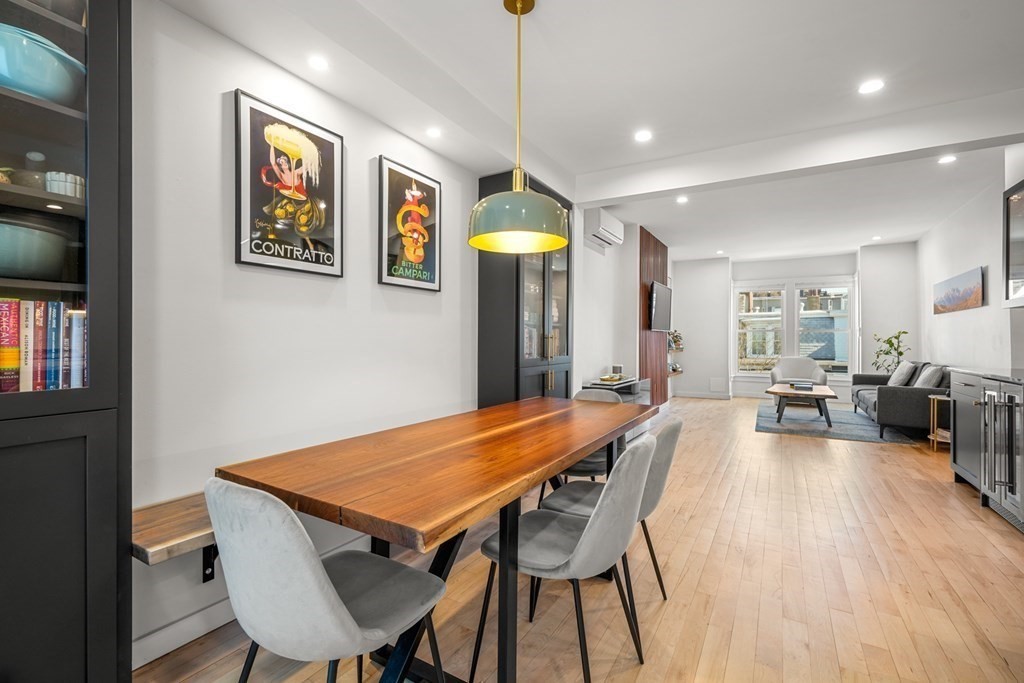261 West Fifth Street, Unit 2 Boston, MA 02127 - Photo 2 of 31 a view of a dining room with furniture window and wooden floor