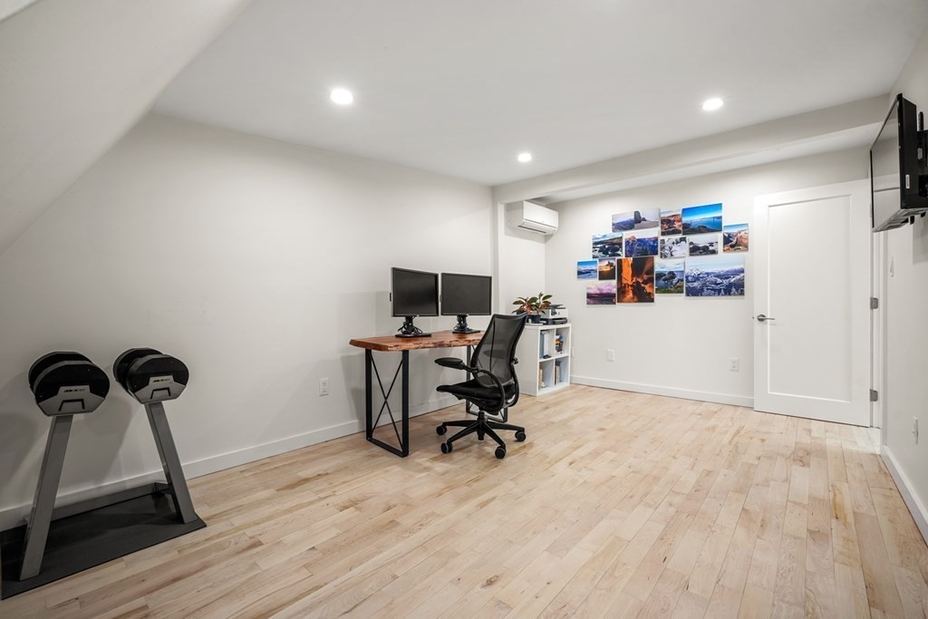 261 West Fifth Street, Unit 2 Boston, MA 02127 - Photo 26 of 31 a view of a room with gym equipment