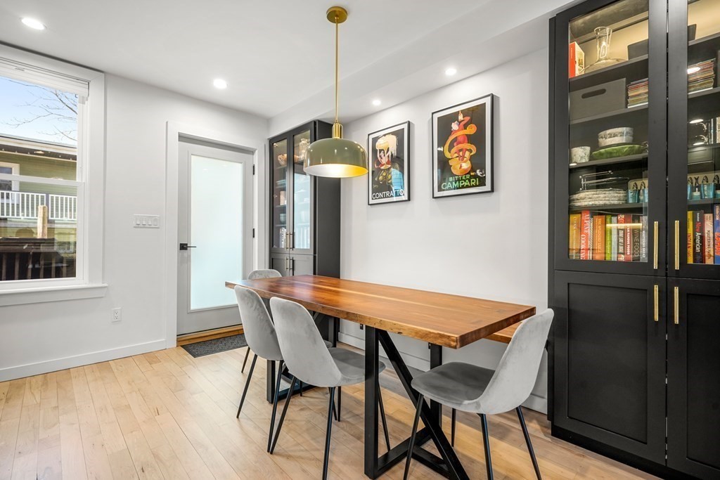 261 West Fifth Street, Unit 2 Boston, MA 02127 - Photo 8 of 31 a view of a dining room with furniture and window