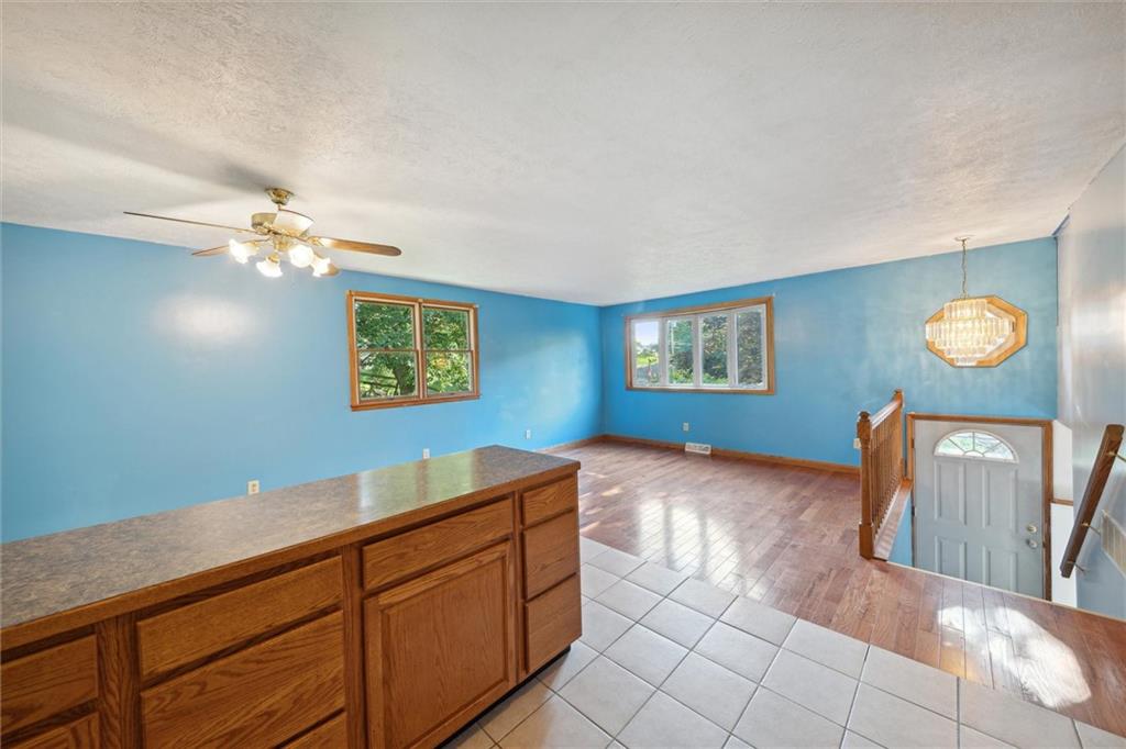826 Pony Farm Road Kittanning, PA 16201 - Photo 11 of 35 a view of a livingroom with furniture and staircase