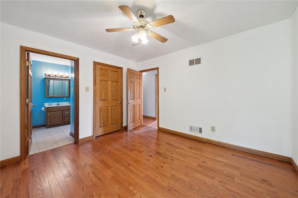 826 Pony Farm Road Kittanning, PA 16201 - Photo 15 of 35 wooden floor in an empty room