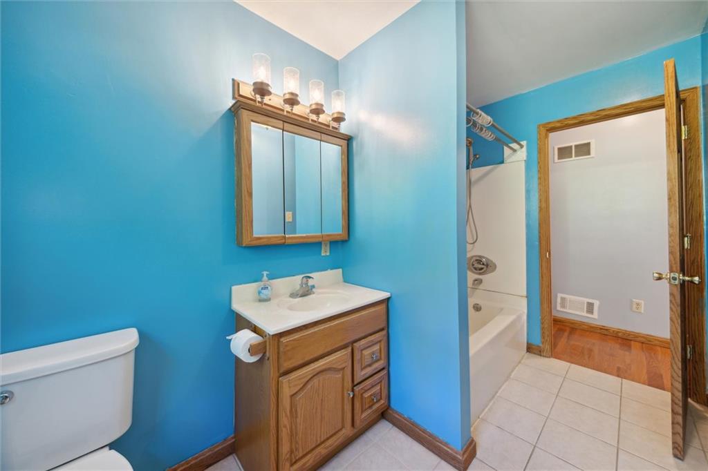 826 Pony Farm Road Kittanning, PA 16201 - Photo 16 of 35 a bathroom with a sink a toilet and shower