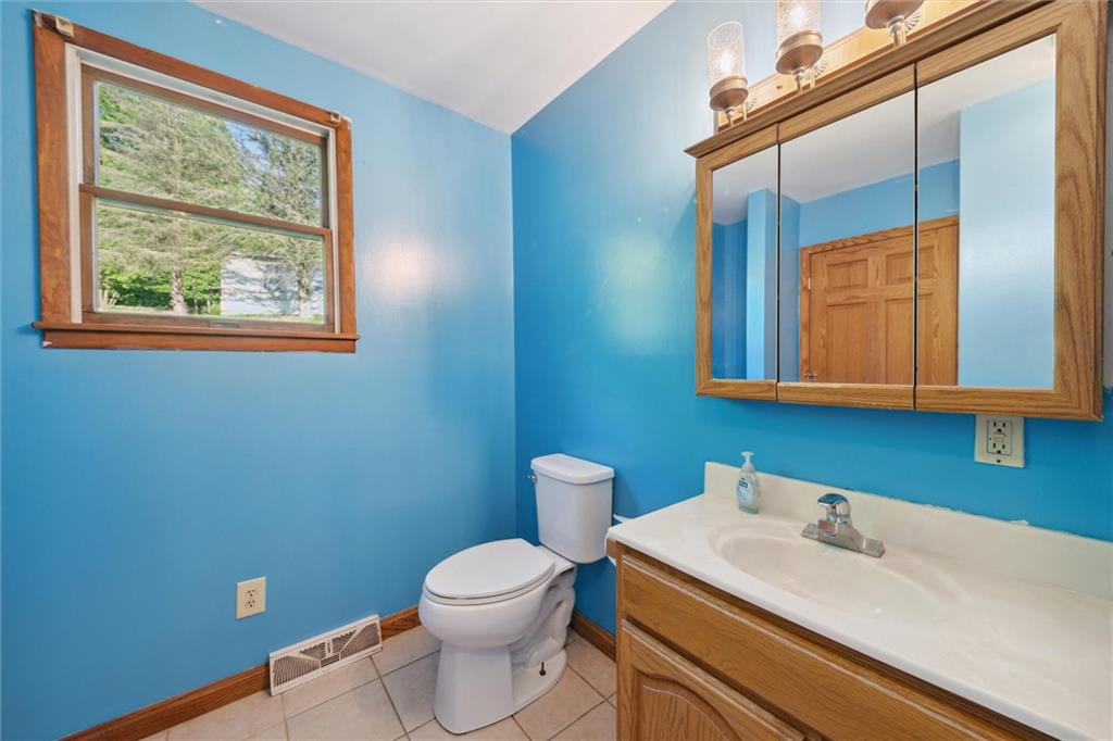 826 Pony Farm Road Kittanning, PA 16201 - Photo 17 of 35 a bathroom with a toilet sink and mirror