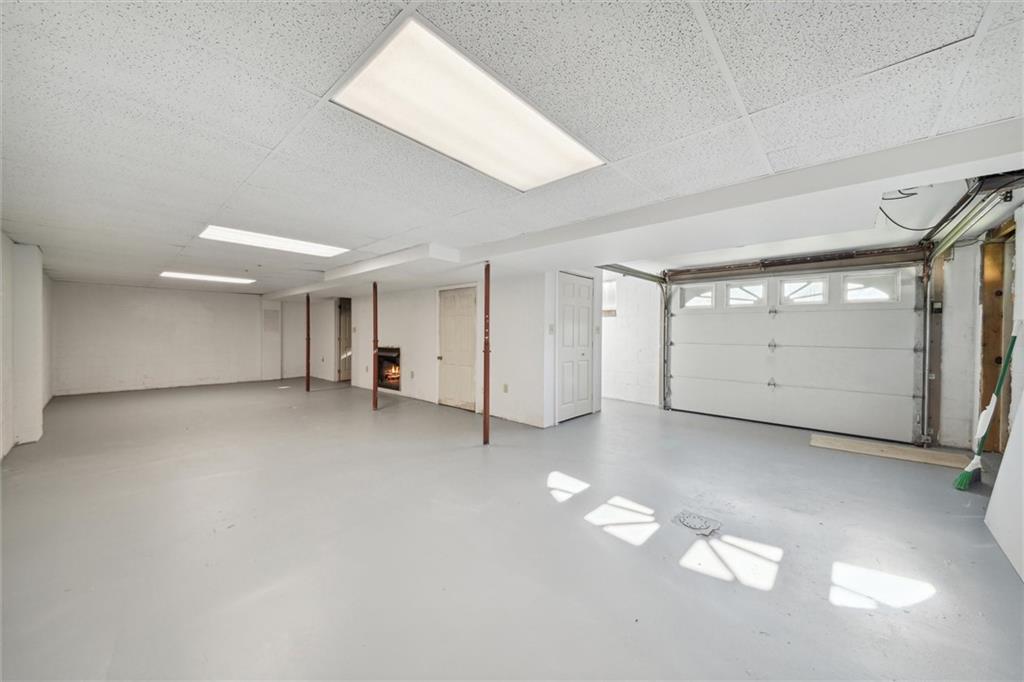 826 Pony Farm Road Kittanning, PA 16201 - Photo 25 of 35 en empty room with windows and pillars in it