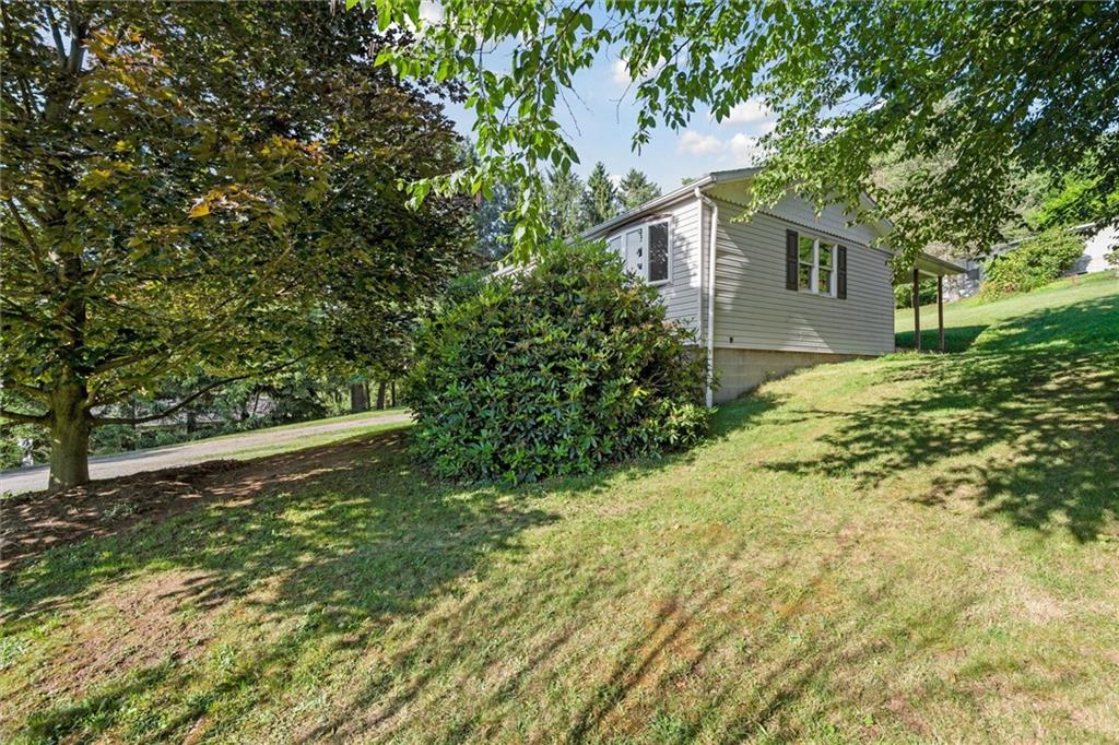 826 Pony Farm Road Kittanning, PA 16201 - Photo 28 of 35 a view of a house with a yard