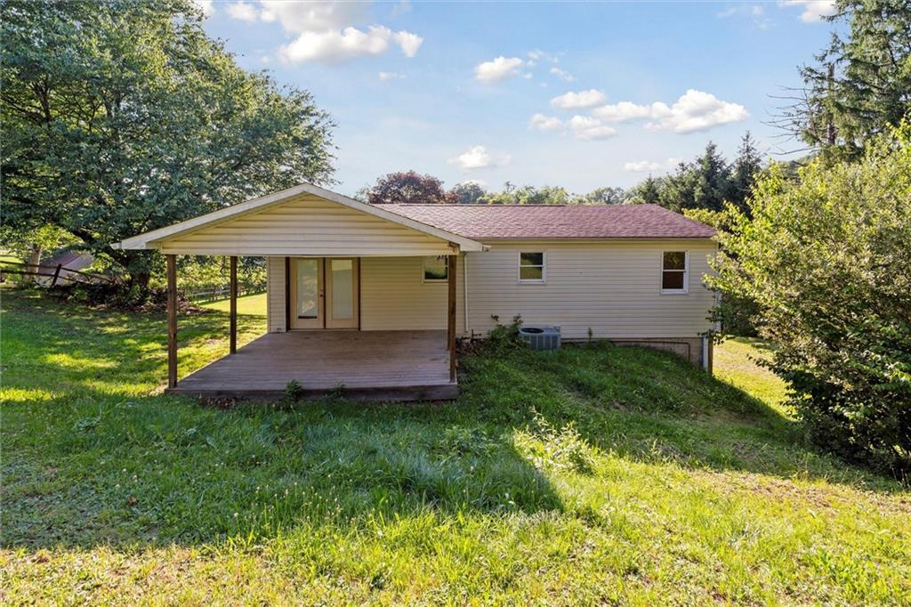 826 Pony Farm Road Kittanning, PA 16201 - Photo 31 of 35 a view of a house with a yard and sitting area