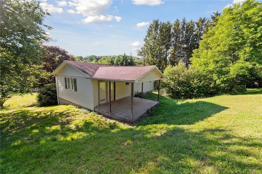 826 Pony Farm Road Kittanning, PA 16201 - Photo 32 of 35 a view of a house with a yard and tree s