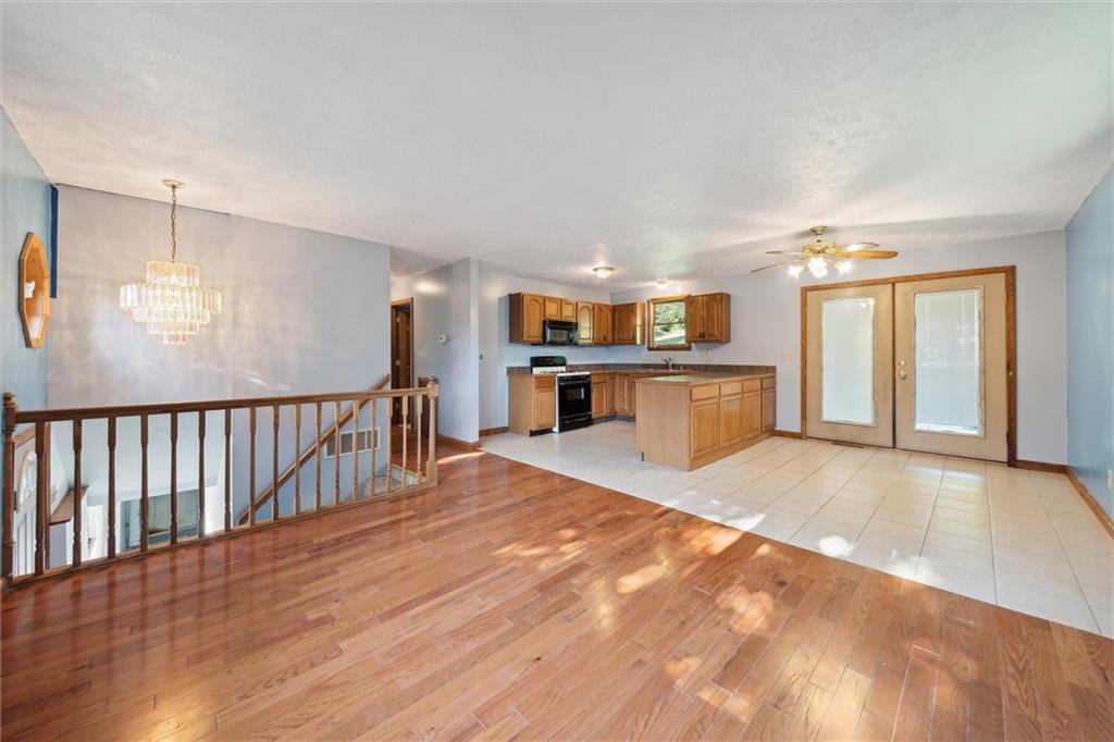 826 Pony Farm Road Kittanning, PA 16201 - Photo 5 of 35 a view of a kitchen with a sink and a large window