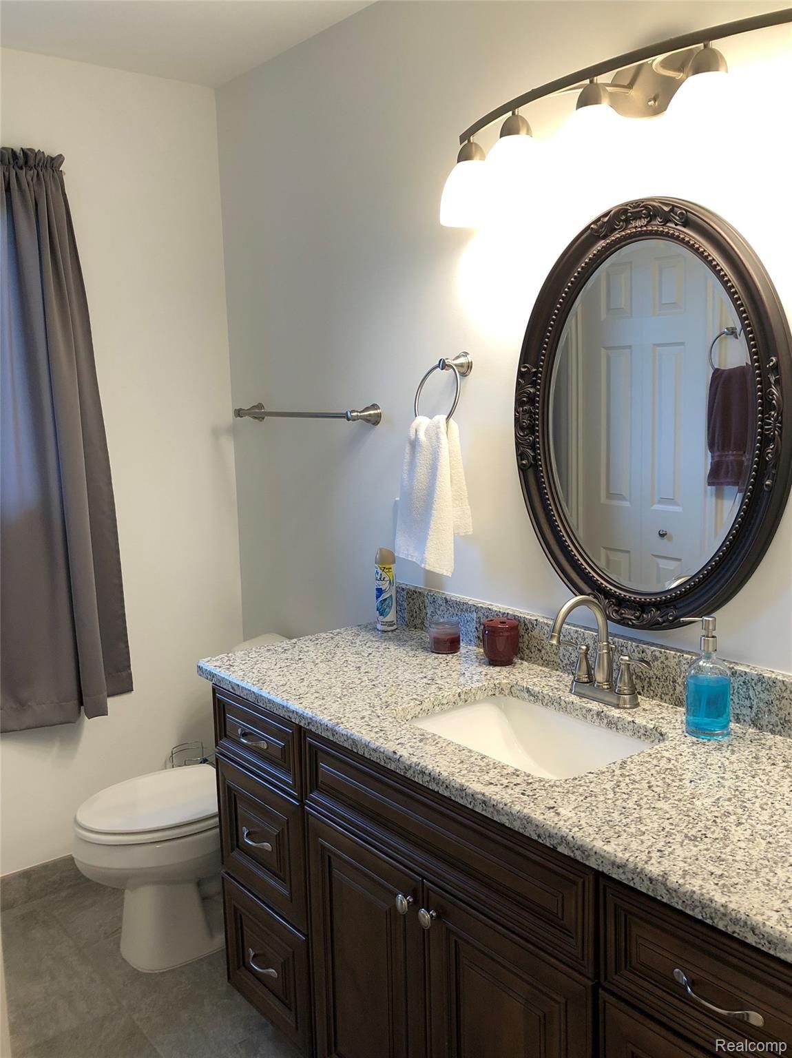 4960 Glover Road Almont, MI 48003 - Photo 27 of 35 2nd full bath with granite counter top and large undermount sink