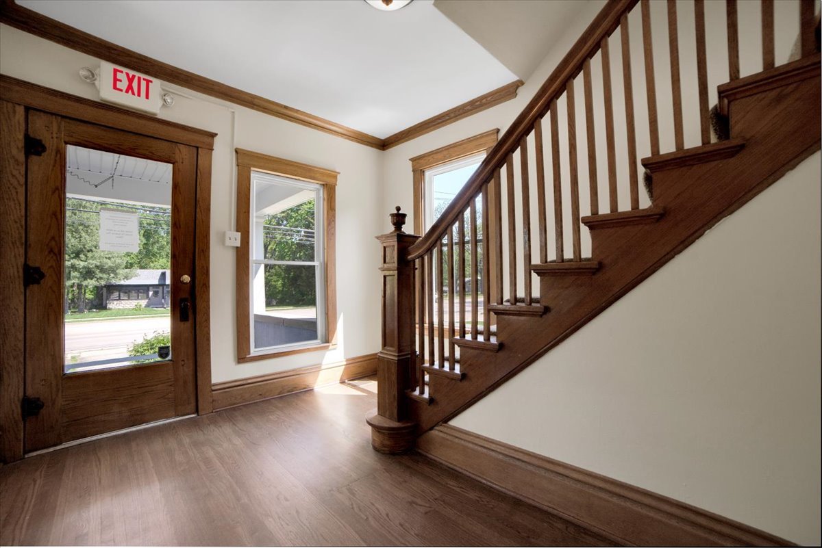 155 Chicago Road Oswego, IL 60543 - Photo 12 of 50 a view of staircase with railing and a window