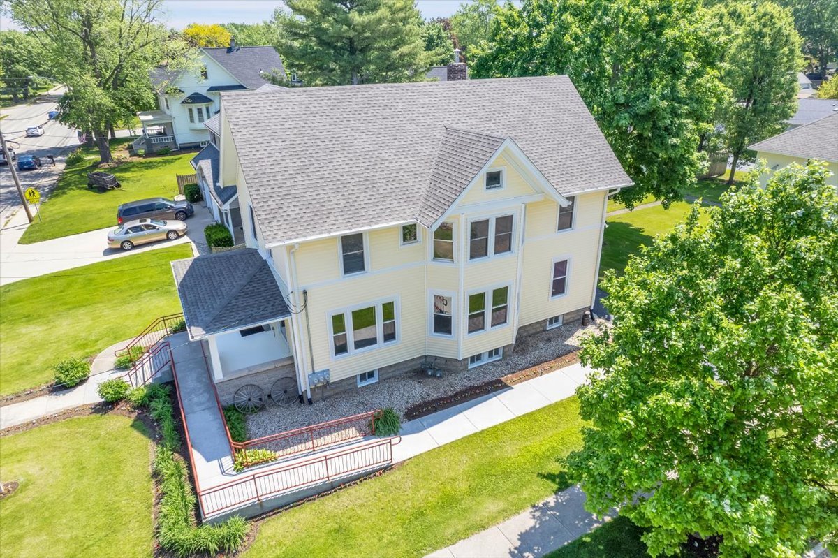 155 Chicago Road Oswego, IL 60543 - Photo 2 of 50 an aerial view of a house with swimming pool and porch