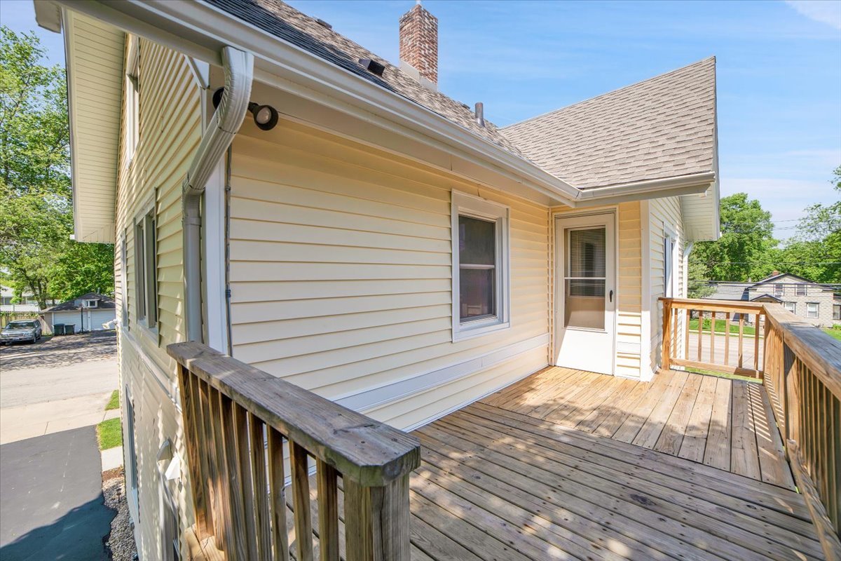 155 Chicago Road Oswego, IL 60543 - Photo 23 of 50 a view of house with wooden deck and furniture