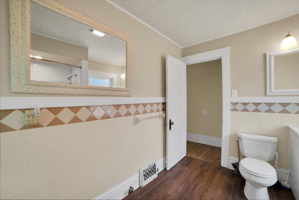 155 Chicago Road Oswego, IL 60543 - Photo 33 of 50 a bathroom with a toilet and a shower