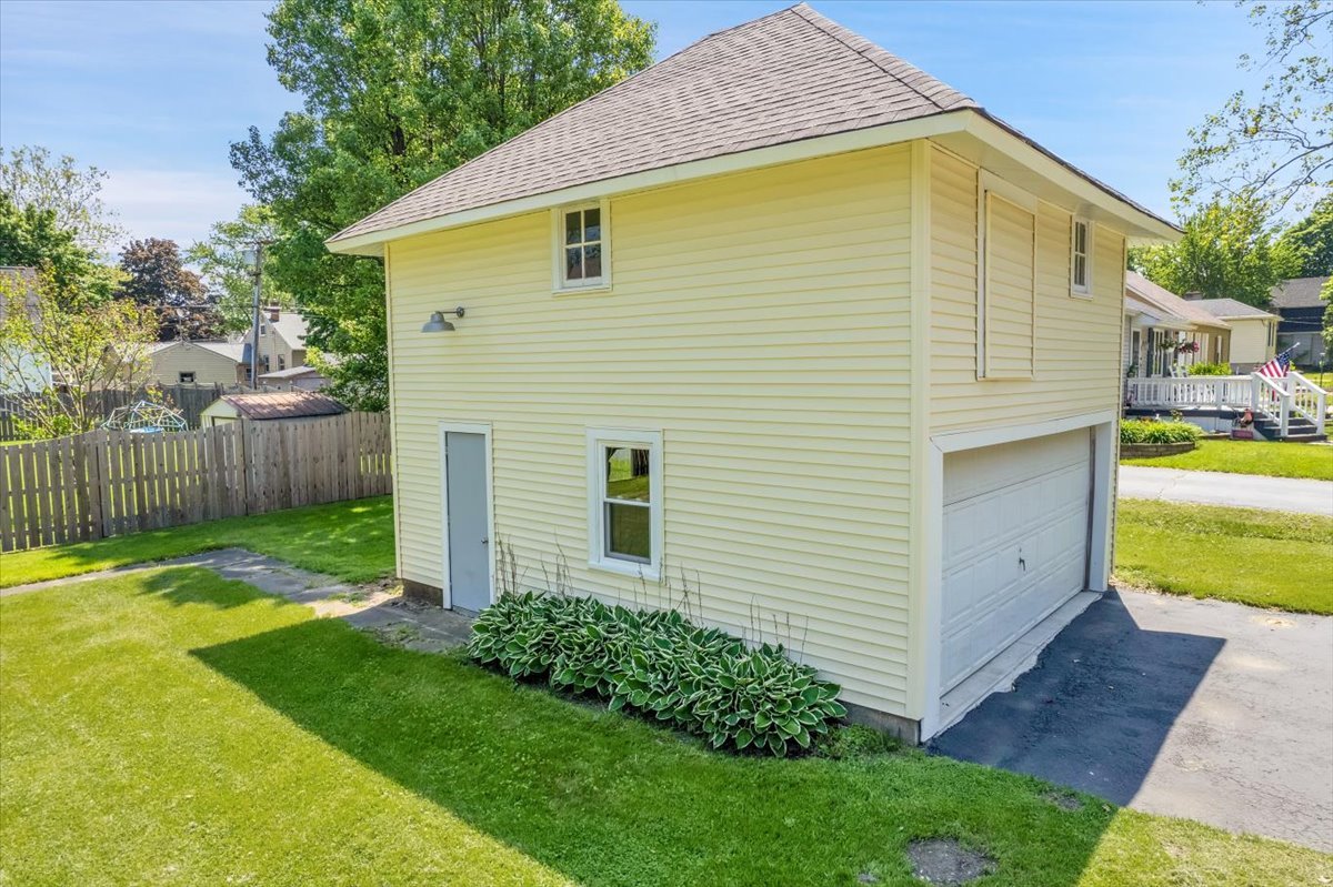 155 Chicago Road Oswego, IL 60543 - Photo 7 of 50 a view of a backyard with a small cabin