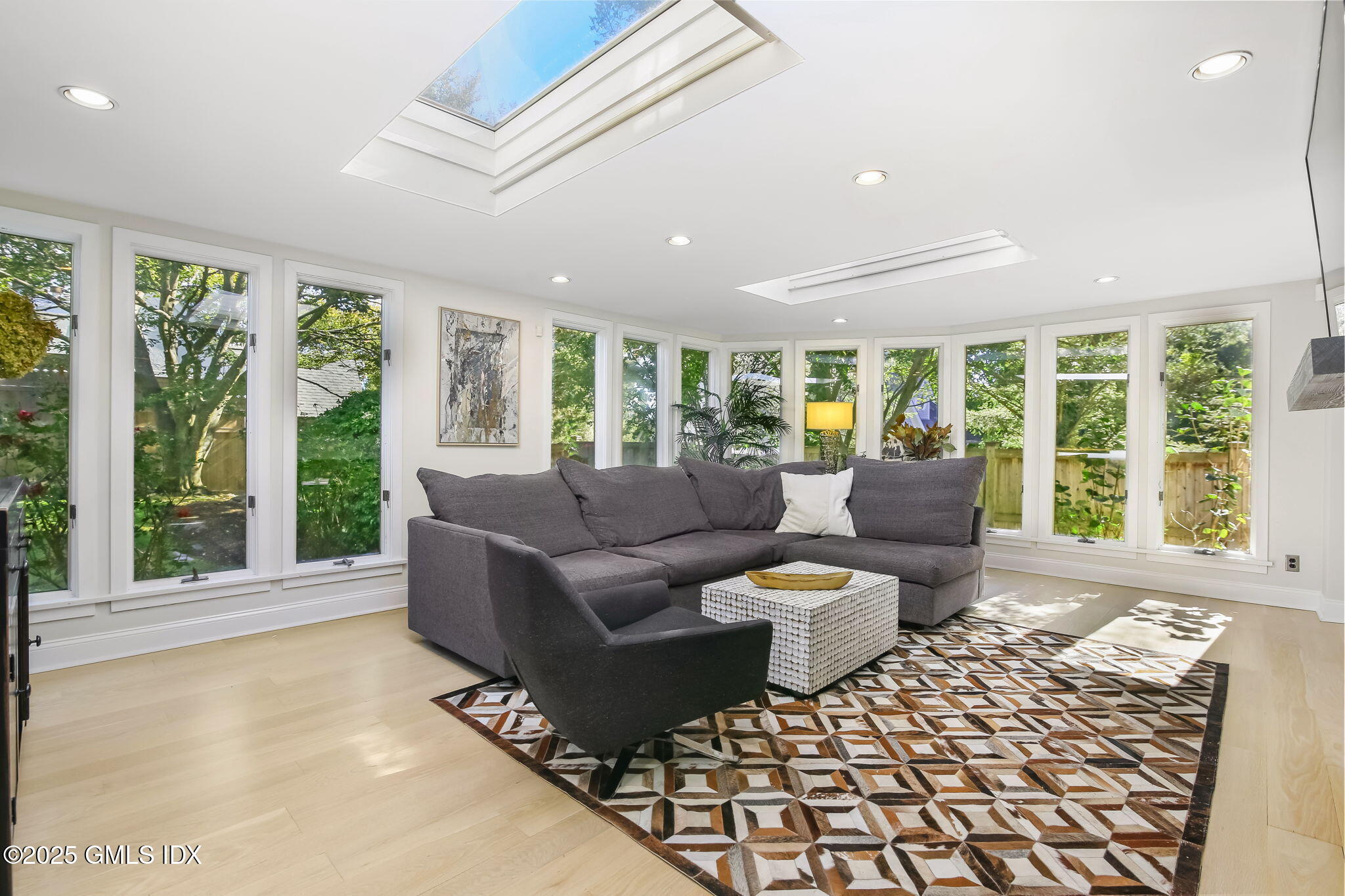 7 Stanwich Road Greenwich, CT 06830 - Photo 11 of 38 a living room with furniture and a large window