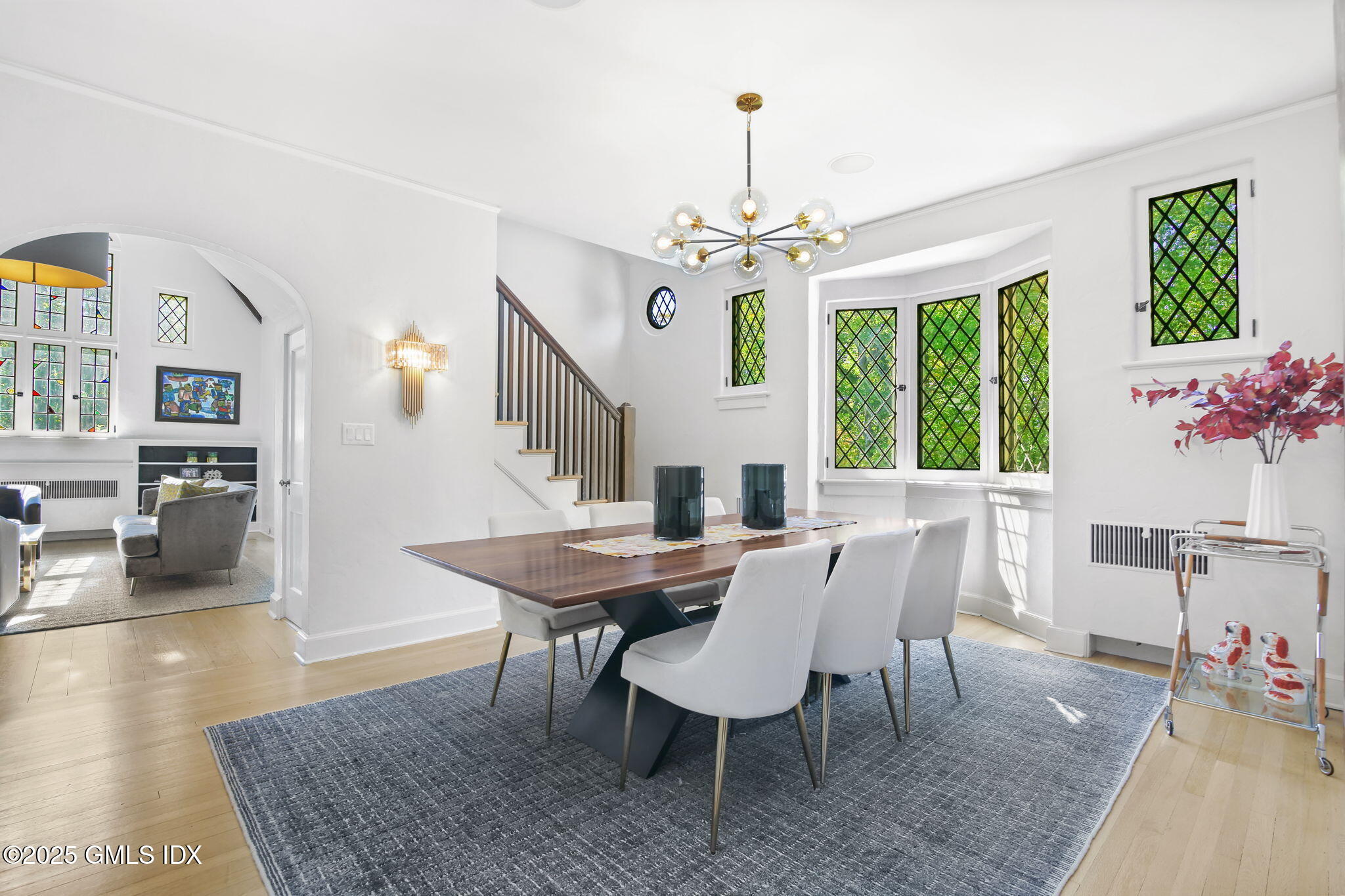 7 Stanwich Road Greenwich, CT 06830 - Photo 12 of 38 a view of a dining room with furniture window and wooden floor