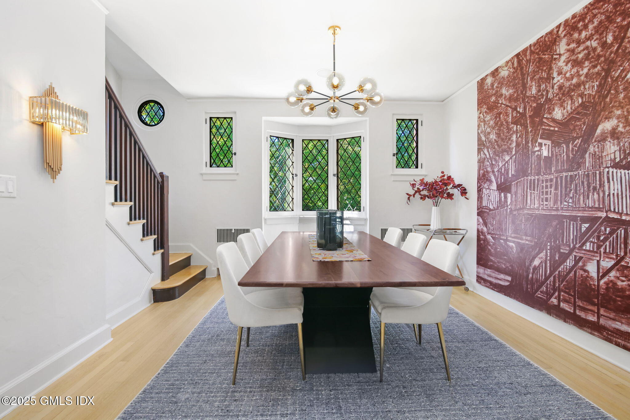 7 Stanwich Road Greenwich, CT 06830 - Photo 13 of 38 a view of a dining room with furniture window and wooden floor