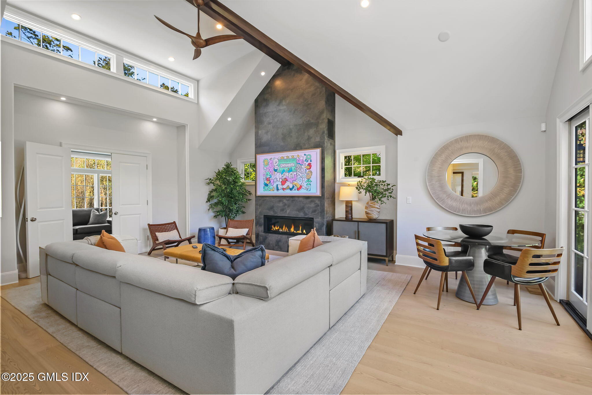 7 Stanwich Road Greenwich, CT 06830 - Photo 20 of 38 a living room with fireplace furniture and a large mirror