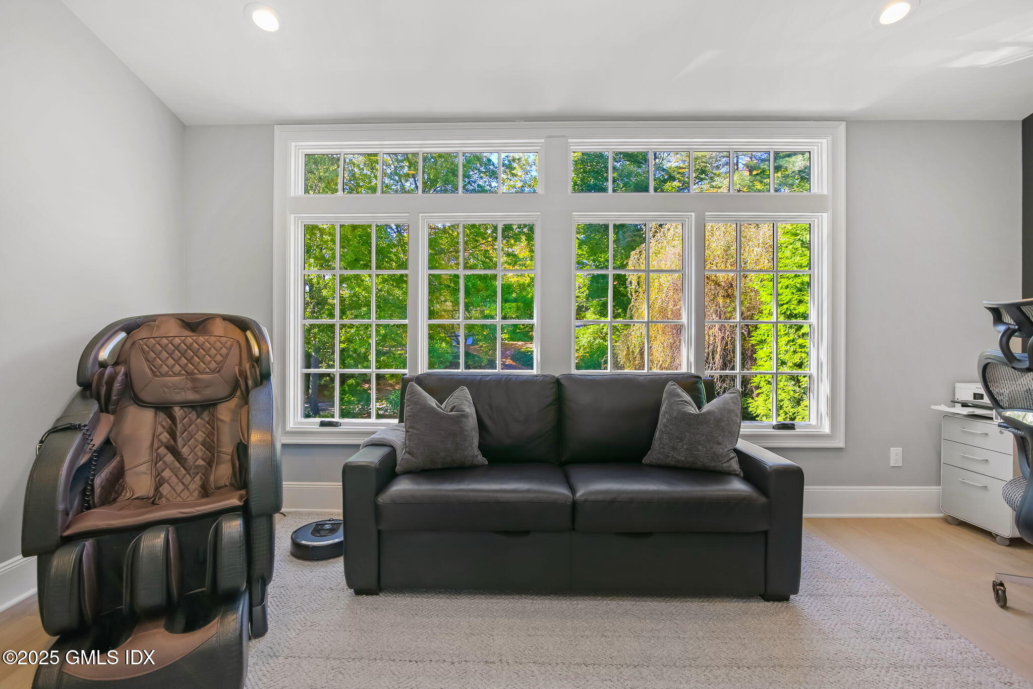 7 Stanwich Road Greenwich, CT 06830 - Photo 22 of 38 a living room with furniture and a large window