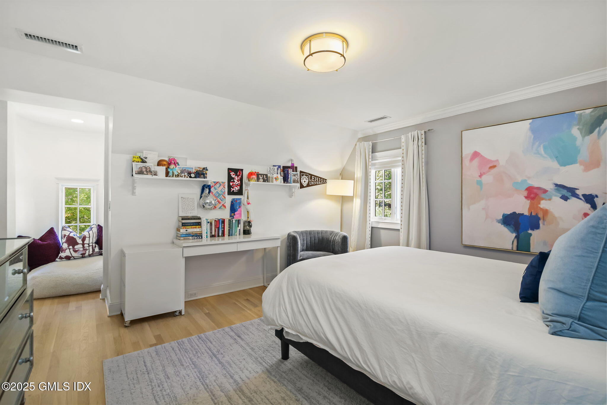 7 Stanwich Road Greenwich, CT 06830 - Photo 28 of 38 a bedroom with a bed and a couch