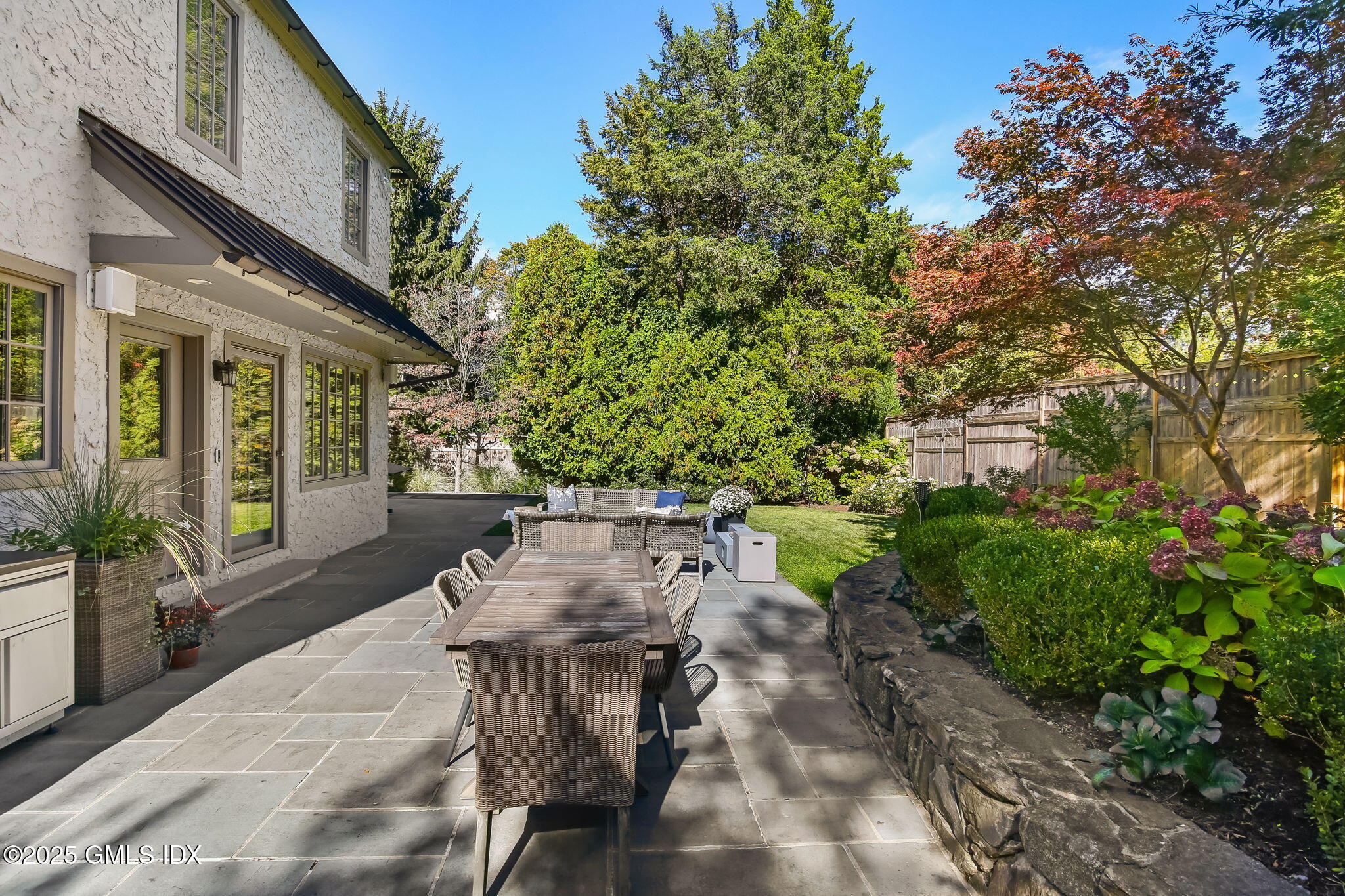 7 Stanwich Road Greenwich, CT 06830 - Photo 35 of 38 a view of outdoor dining space with a patio