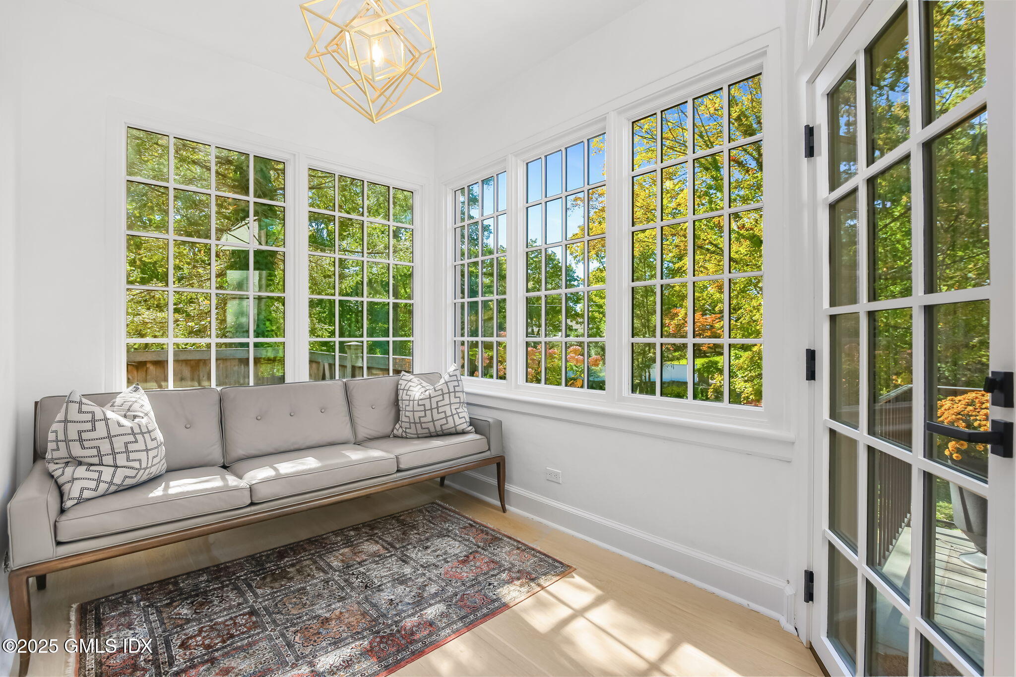 7 Stanwich Road Greenwich, CT 06830 - Photo 4 of 38 a living room with furniture and a large window