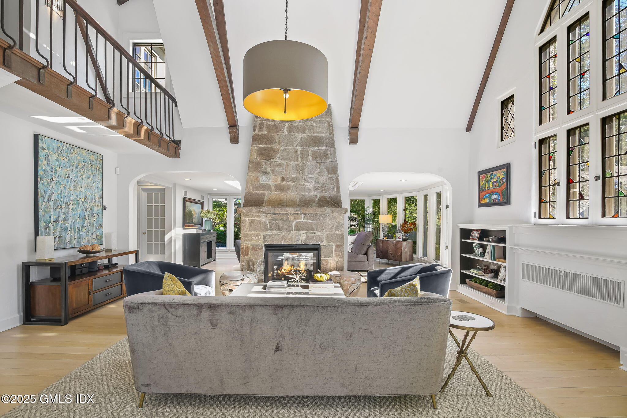 7 Stanwich Road Greenwich, CT 06830 - Photo 5 of 38 a living room with fireplace furniture and a large window