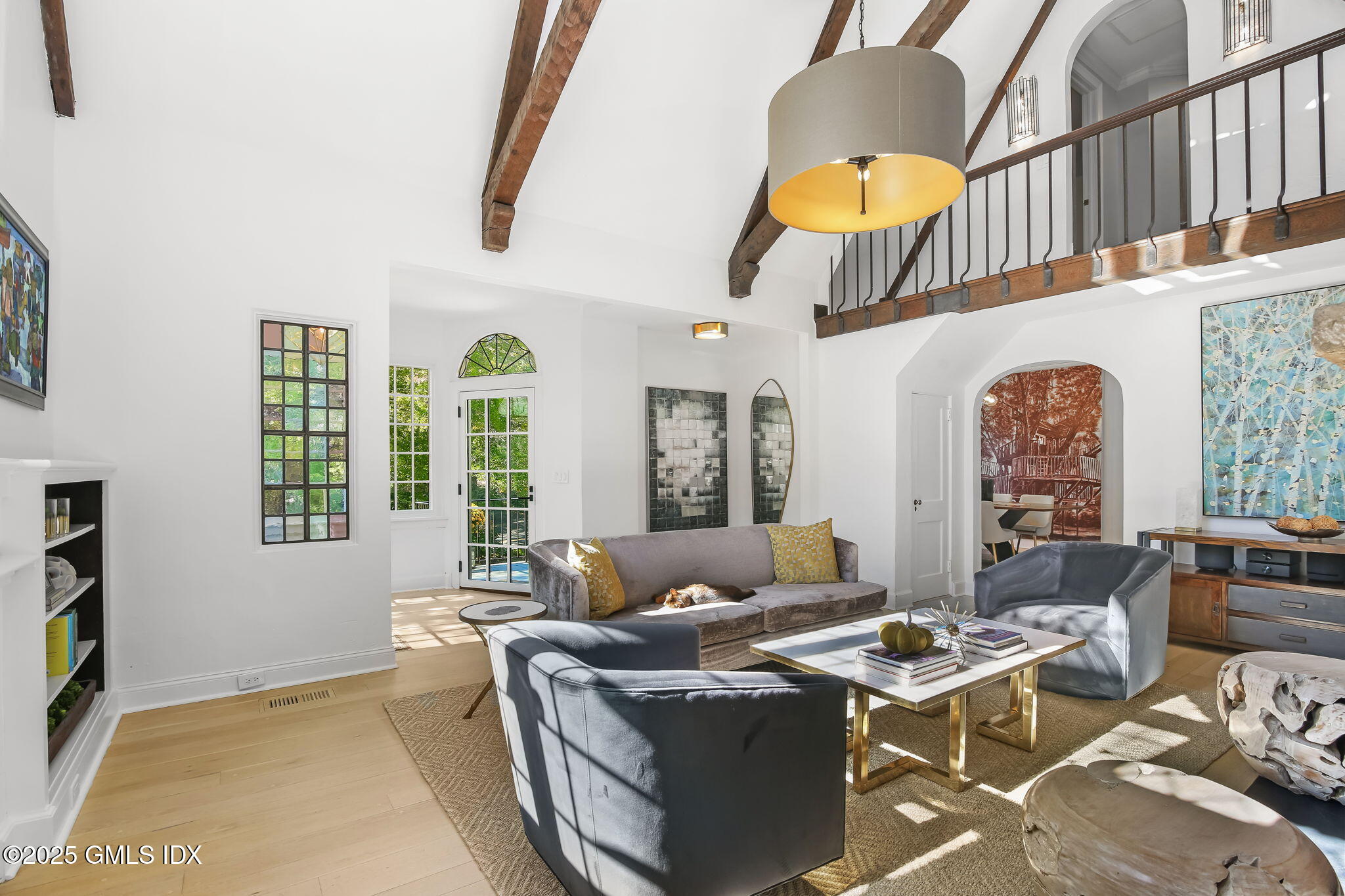 7 Stanwich Road Greenwich, CT 06830 - Photo 8 of 38 a living room with fireplace furniture and a large window