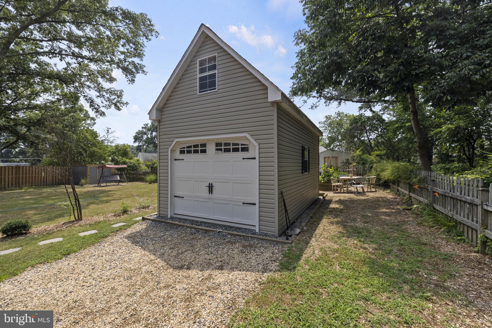 7002 Fort Hunt Road Alexandria, VA 22307 - Photo 24 of 33 Single car garage with loft