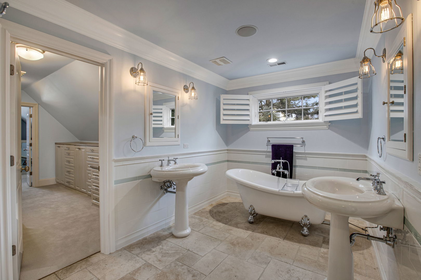 650 South Grove Avenue Barrington, IL 60010 - Photo 21 of 44 a bathroom with a sink and a mirror