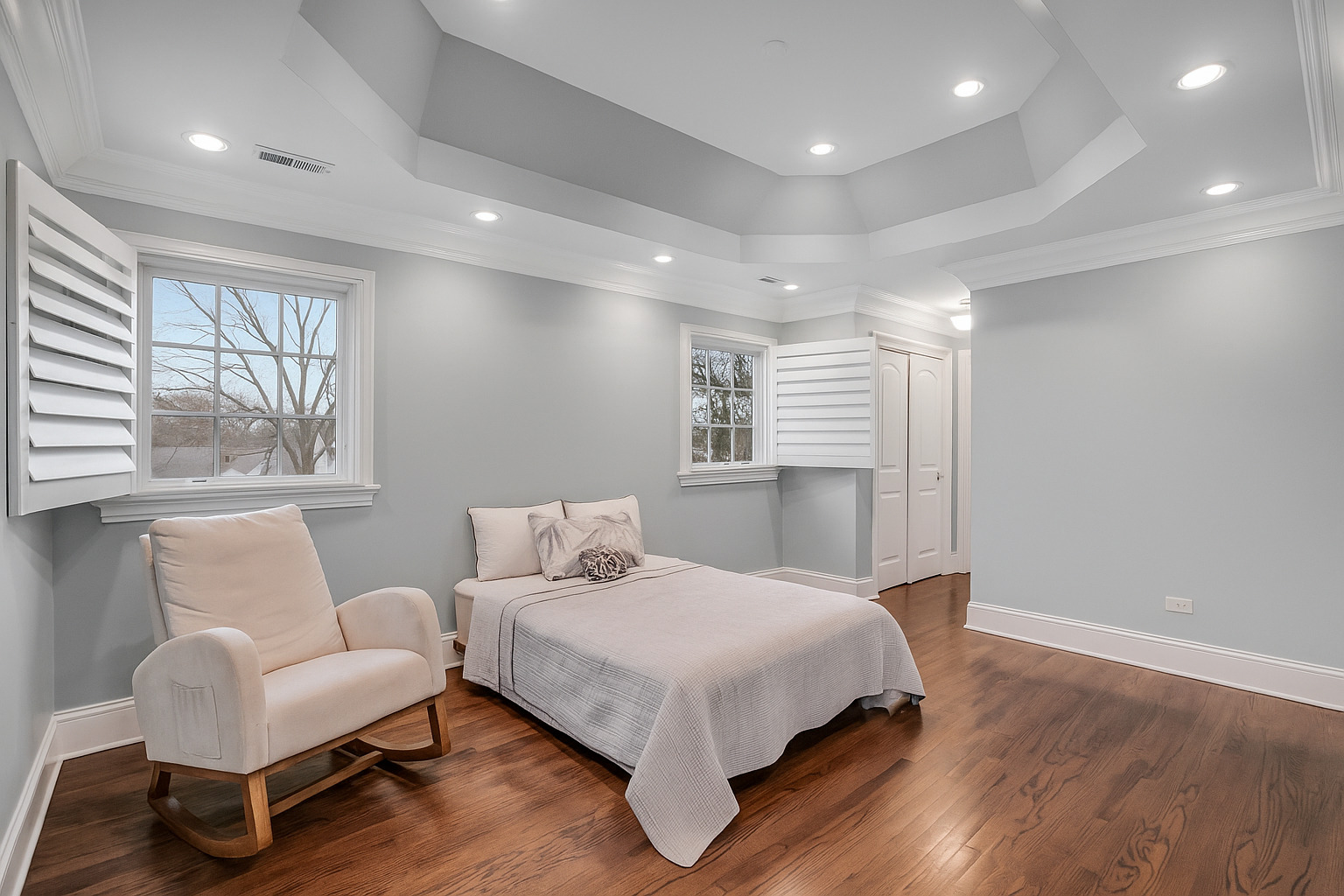 650 South Grove Avenue Barrington, IL 60010 - Photo 25 of 44 a bedroom with a bed and a couch