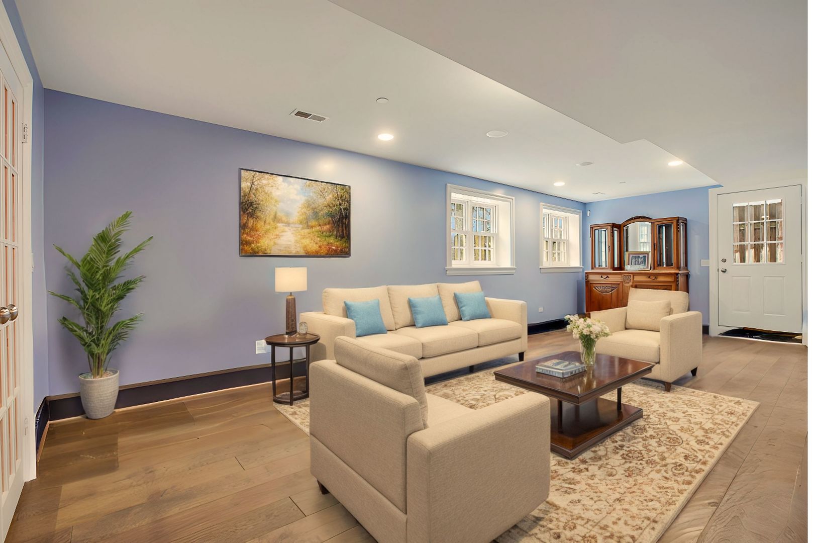 650 South Grove Avenue Barrington, IL 60010 - Photo 30 of 44 a living room with furniture and a potted plant