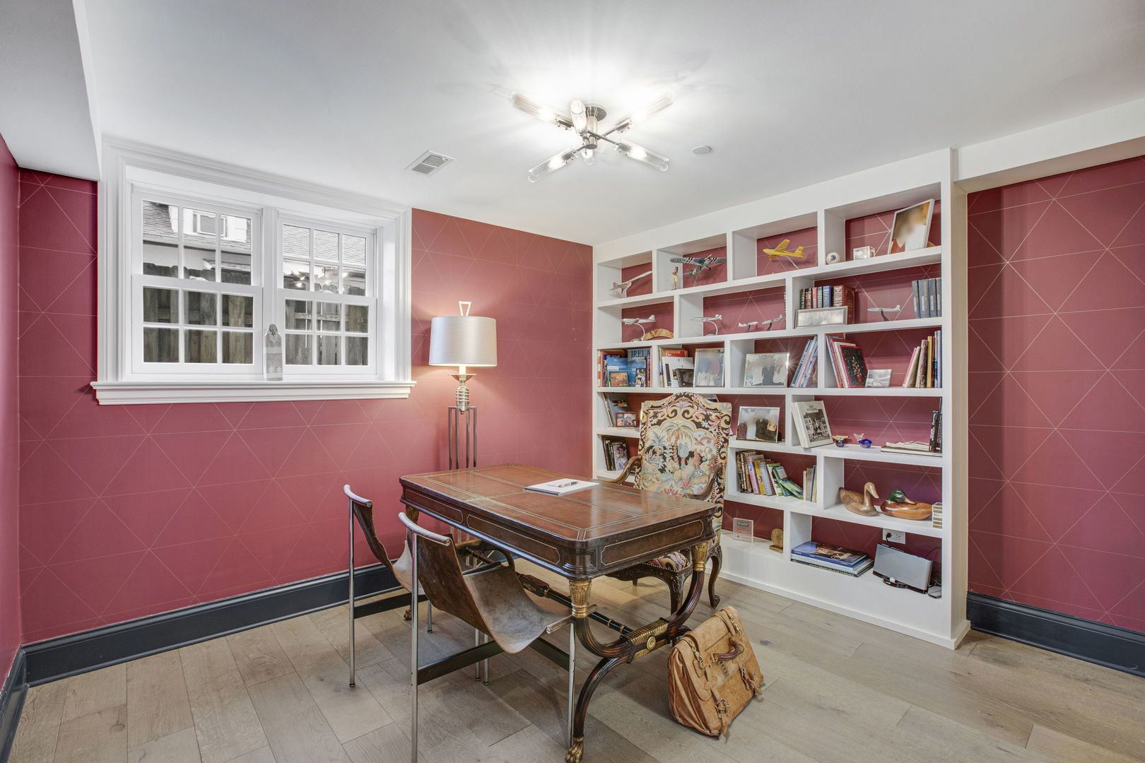 650 South Grove Avenue Barrington, IL 60010 - Photo 33 of 44 a workspace with furniture bookshelf and a window