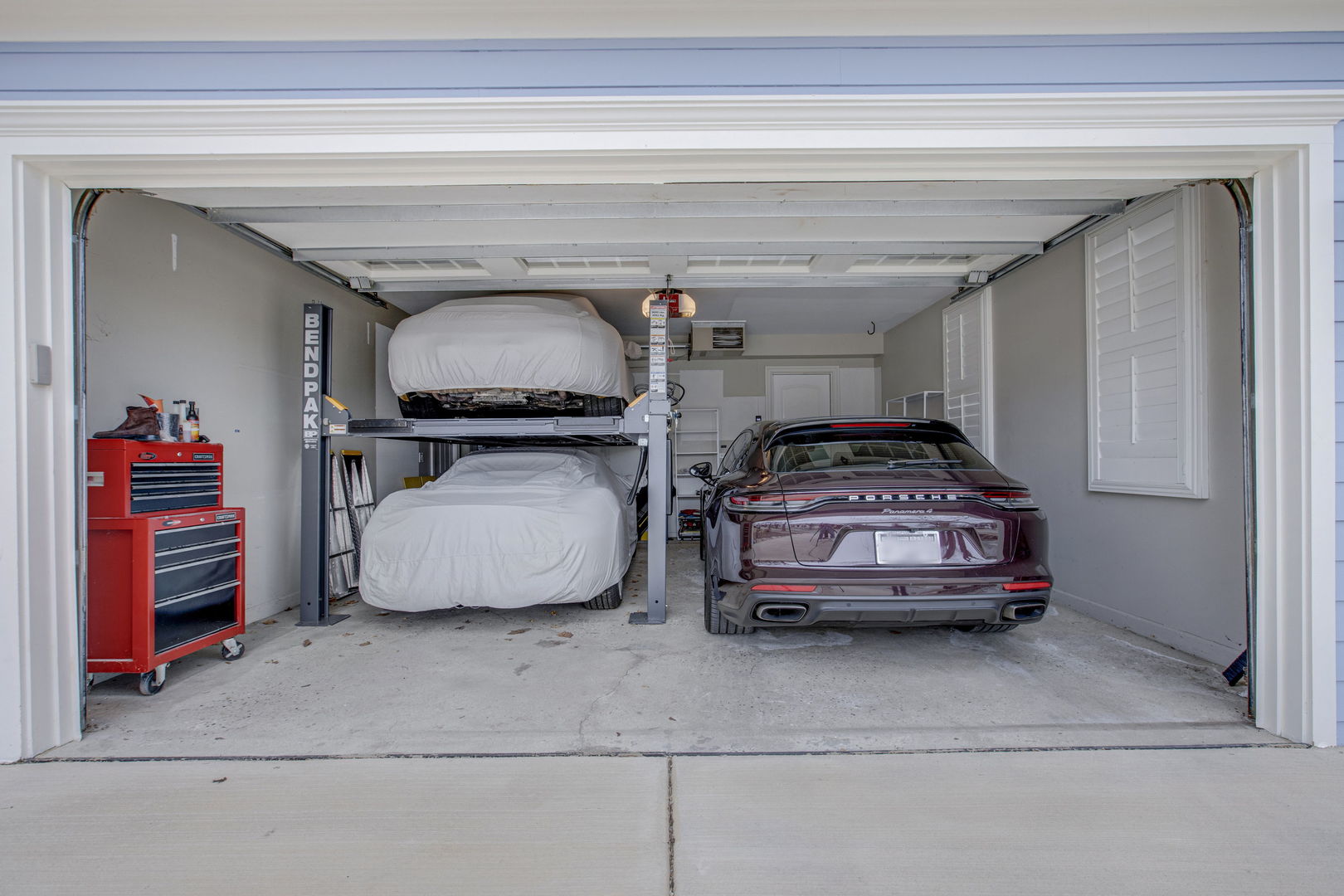650 South Grove Avenue Barrington, IL 60010 - Photo 36 of 44 a car parked in a garage