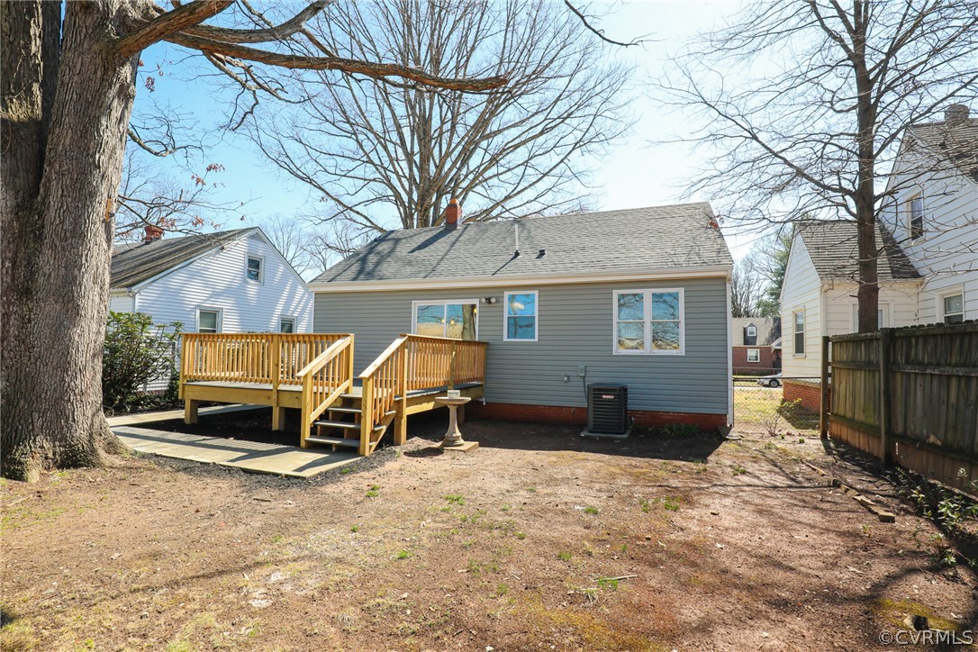 3908 Decatur Street Richmond, VA 23224 - Photo 19 of 23 a view of a house with backyard and a tree