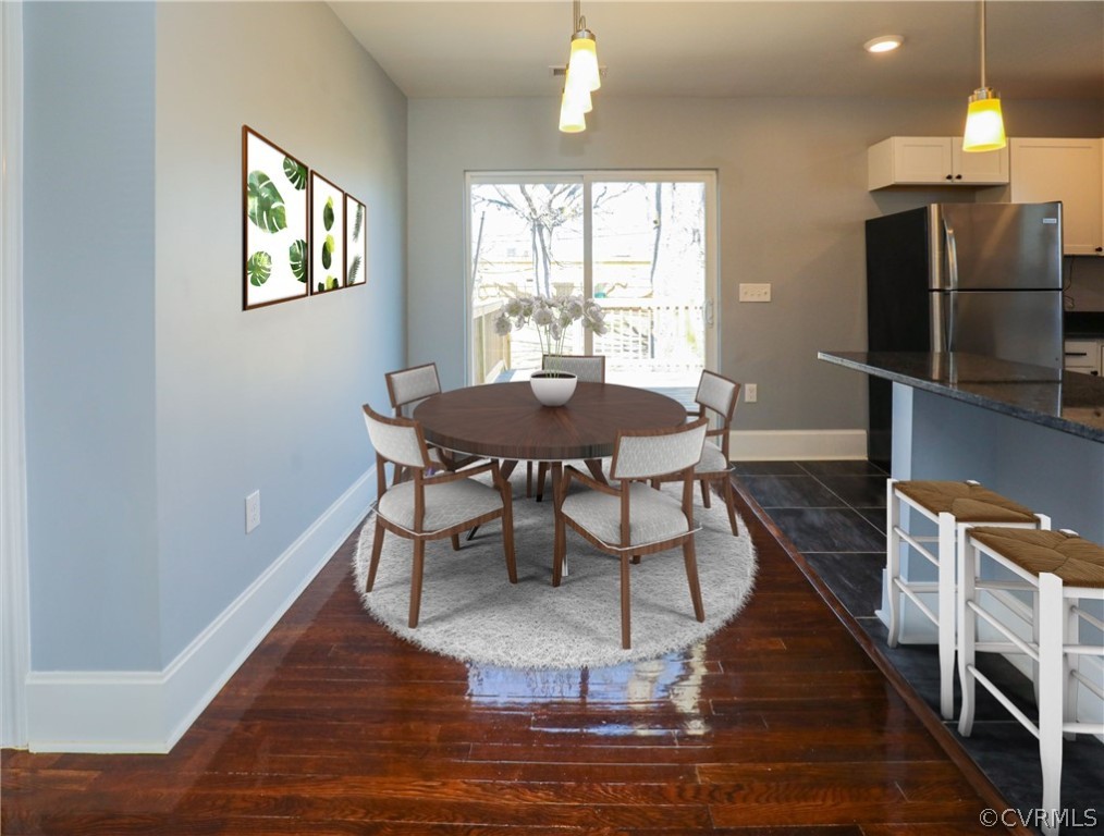 3908 Decatur Street Richmond, VA 23224 - Photo 5 of 23 a view of a dining room with furniture window and wooden floor