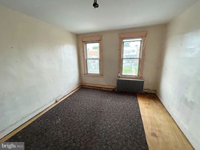 an empty room with windows