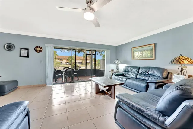 a white toilet sitting next to a shower