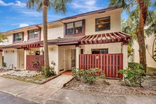 a view of outdoor space with wooden walls