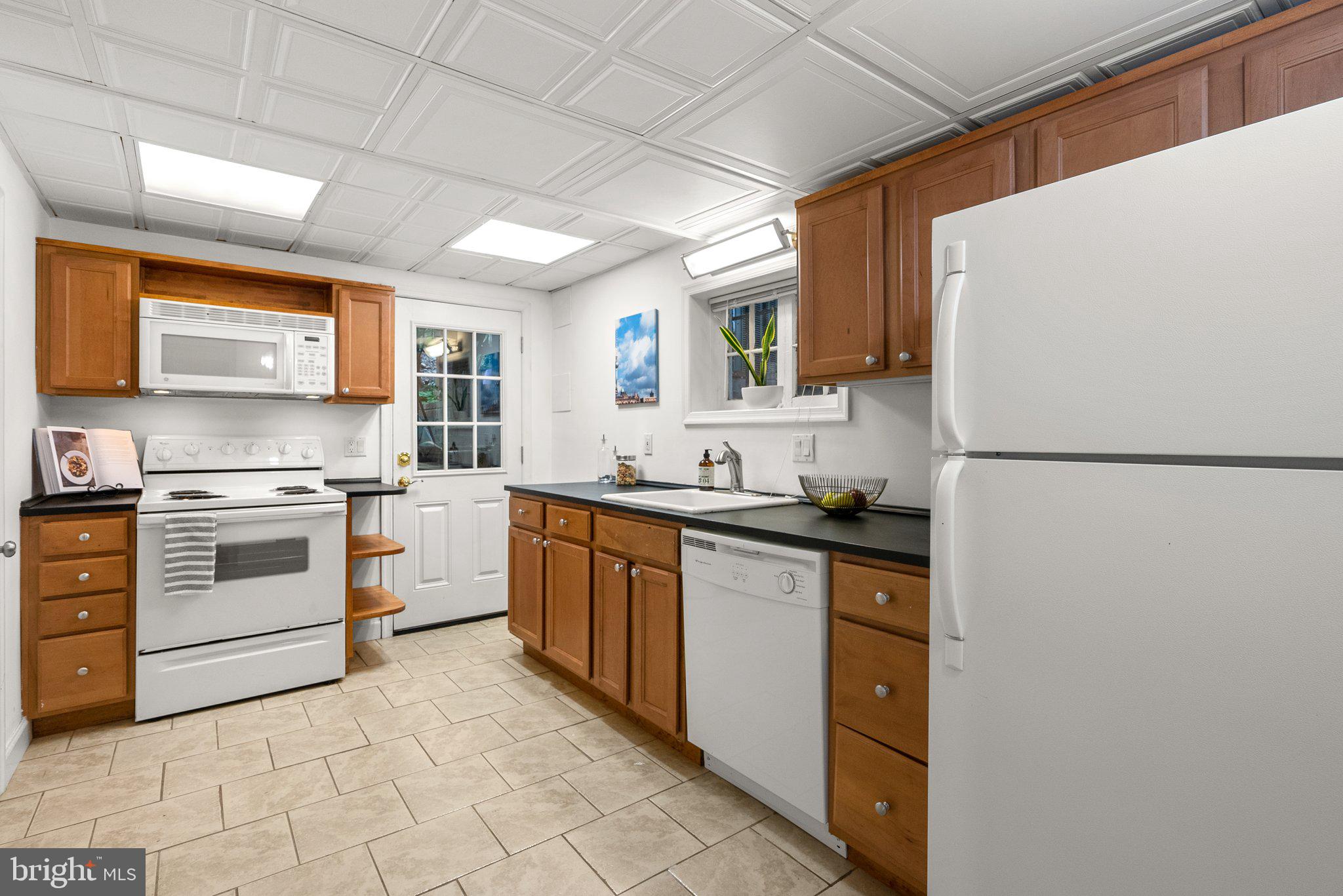 4831 Reservoir Road Northwest Washington, DC 20007 - Photo 32 of 44 Lower level full kitchen