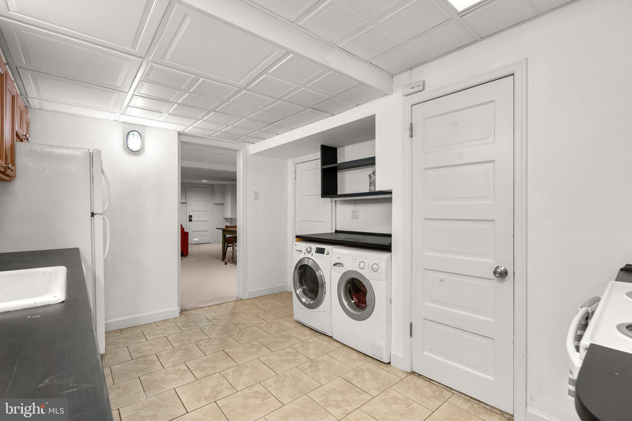 4831 Reservoir Road Northwest Washington, DC 20007 - Photo 34 of 44 Lower level laundry + full bathroom