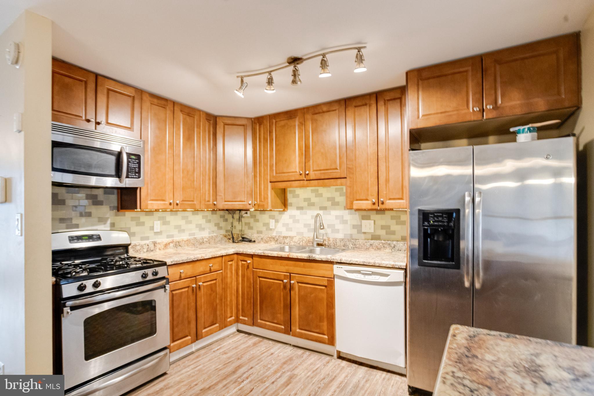 2020 Hanson Road Edgewood, MD 21040 - Photo 12 of 34 a kitchen with a sink stove and refrigerator