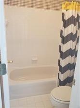 3715 Ridgeside Court Suwanee, GA 30024 - Photo 33 of 44 a bathroom with a toilet and a bathtub