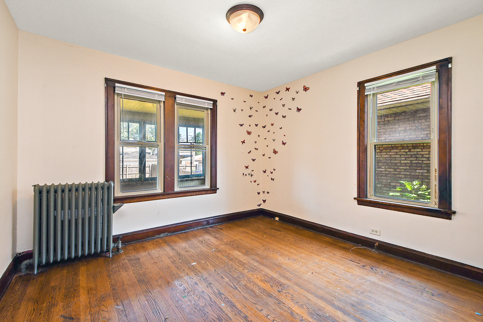2540 Lewis Street Blue Island, IL 60406 - Photo 14 of 27 an empty room with wooden floor and windows
