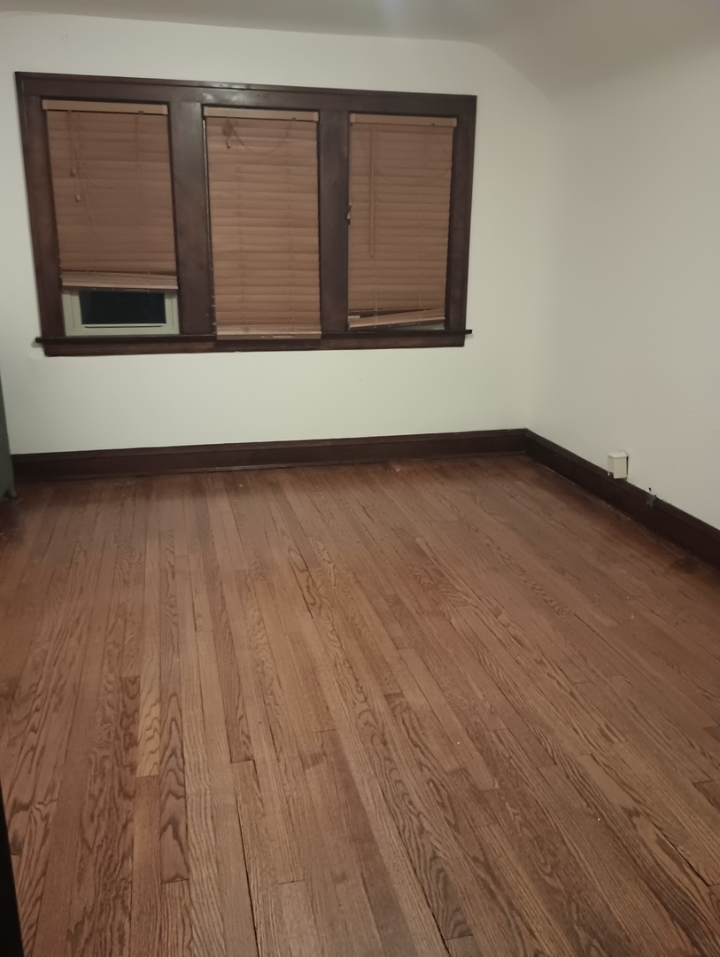 2540 Lewis Street Blue Island, IL 60406 - Photo 19 of 27 a view of wooden floor in a room